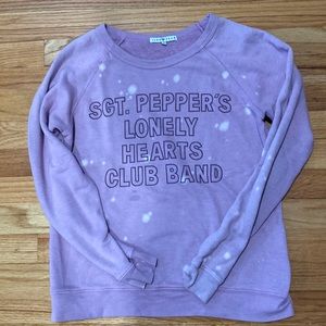 Junk food size small pink tie dye sweatshirt. Small stain.